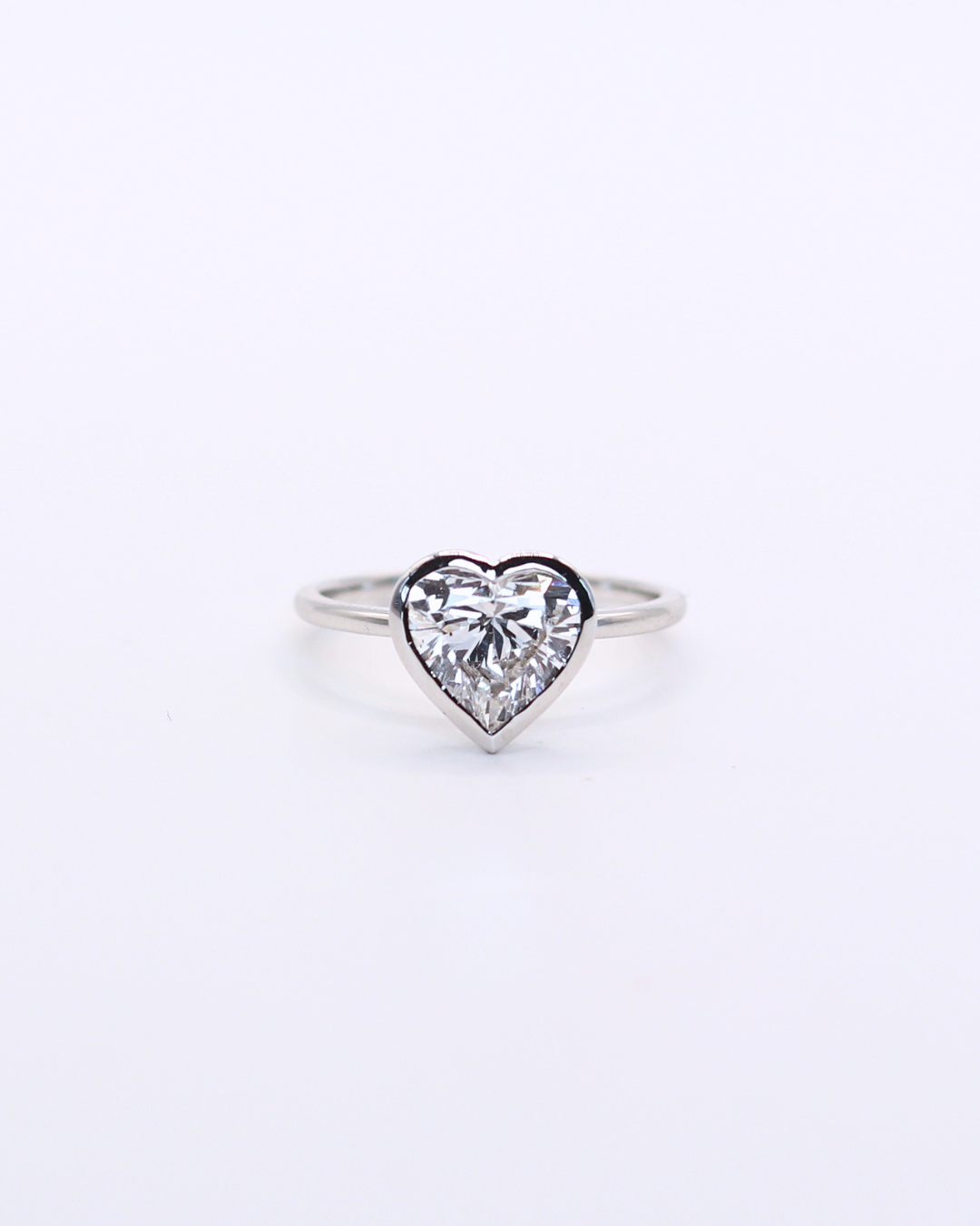 Bezel Heart — A 2-carat heart-cut lab diamond, bezel-set on a 14k white gold shank in a size 7. — view 1 of 6