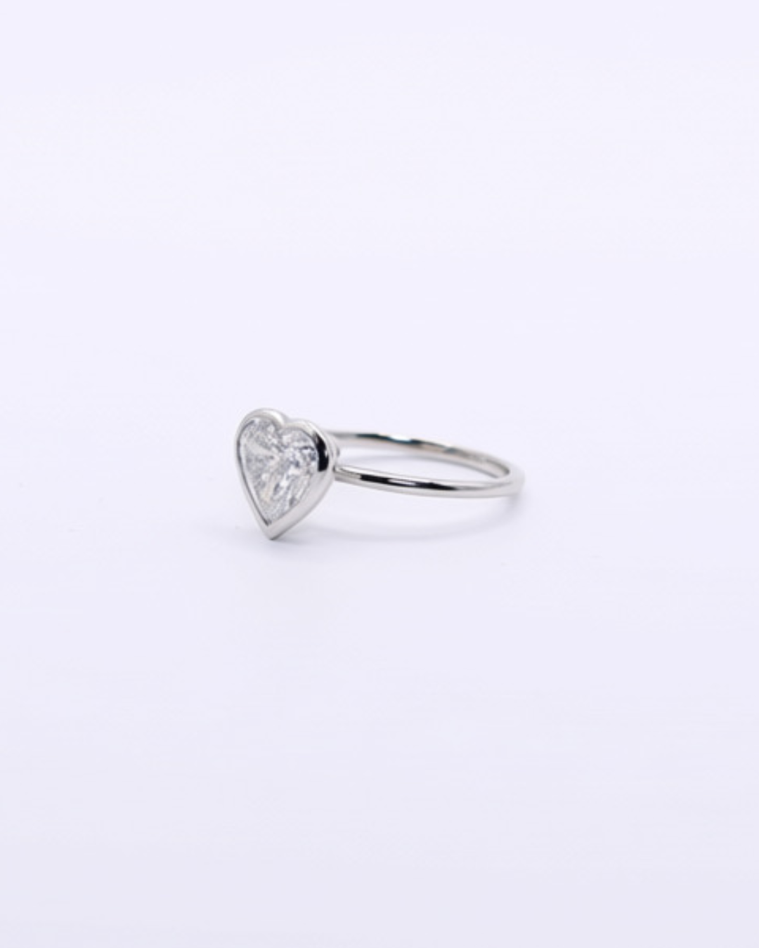 Bezel Heart — A 2-carat heart-cut lab diamond, bezel-set on a 14k white gold shank in a size 7. — view 2 of 6