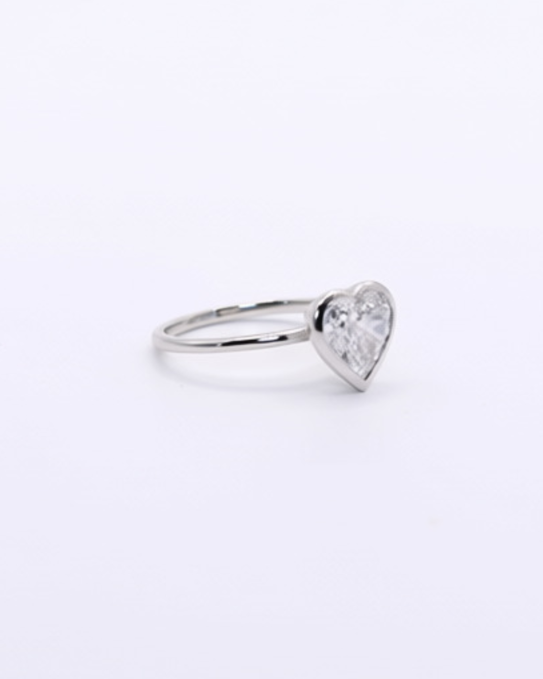Bezel Heart — A 2-carat heart-cut lab diamond, bezel-set on a 14k white gold shank in a size 7. — view 3 of 6